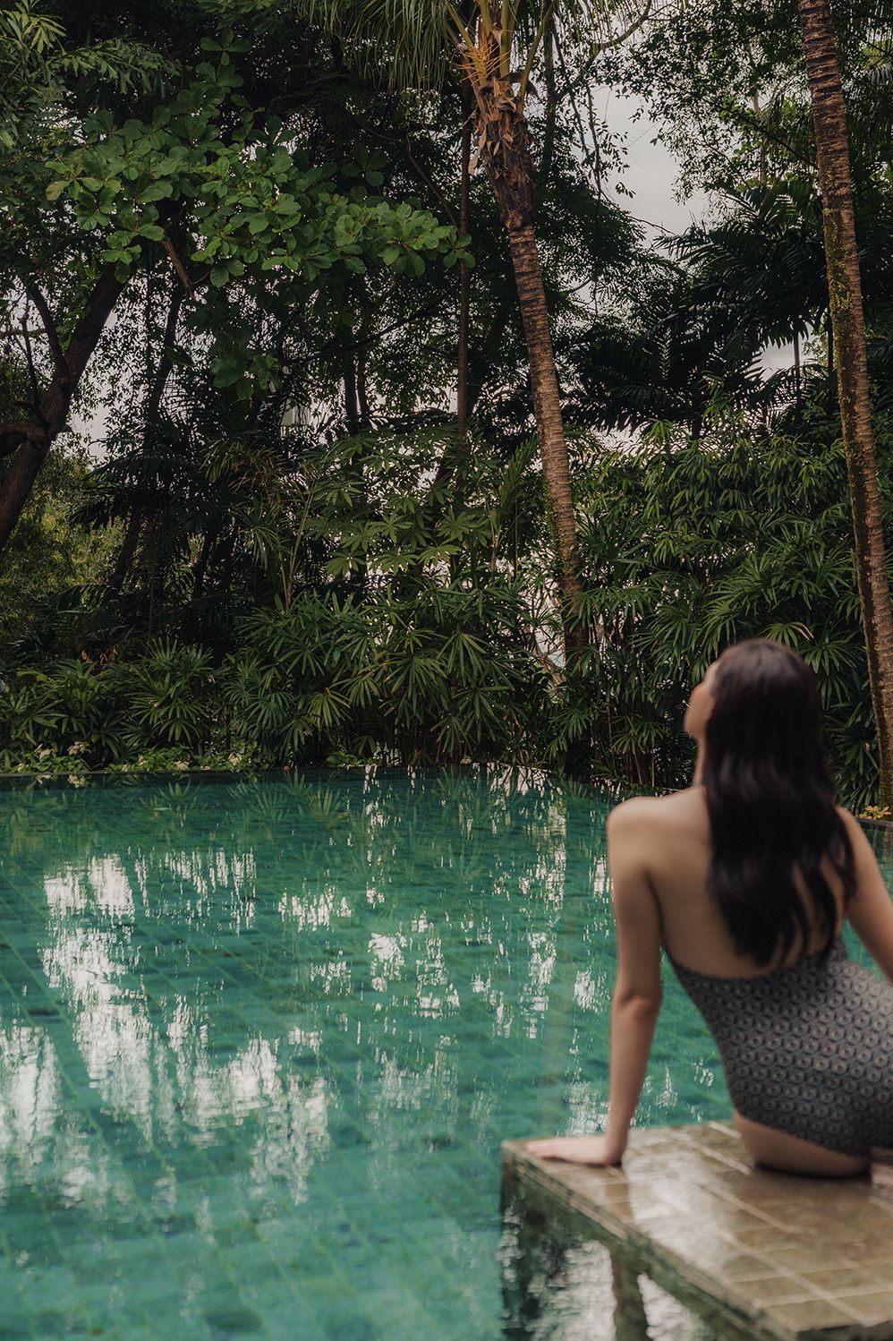 Image may contain Back Body Part Person Adult Bathing and Sitting