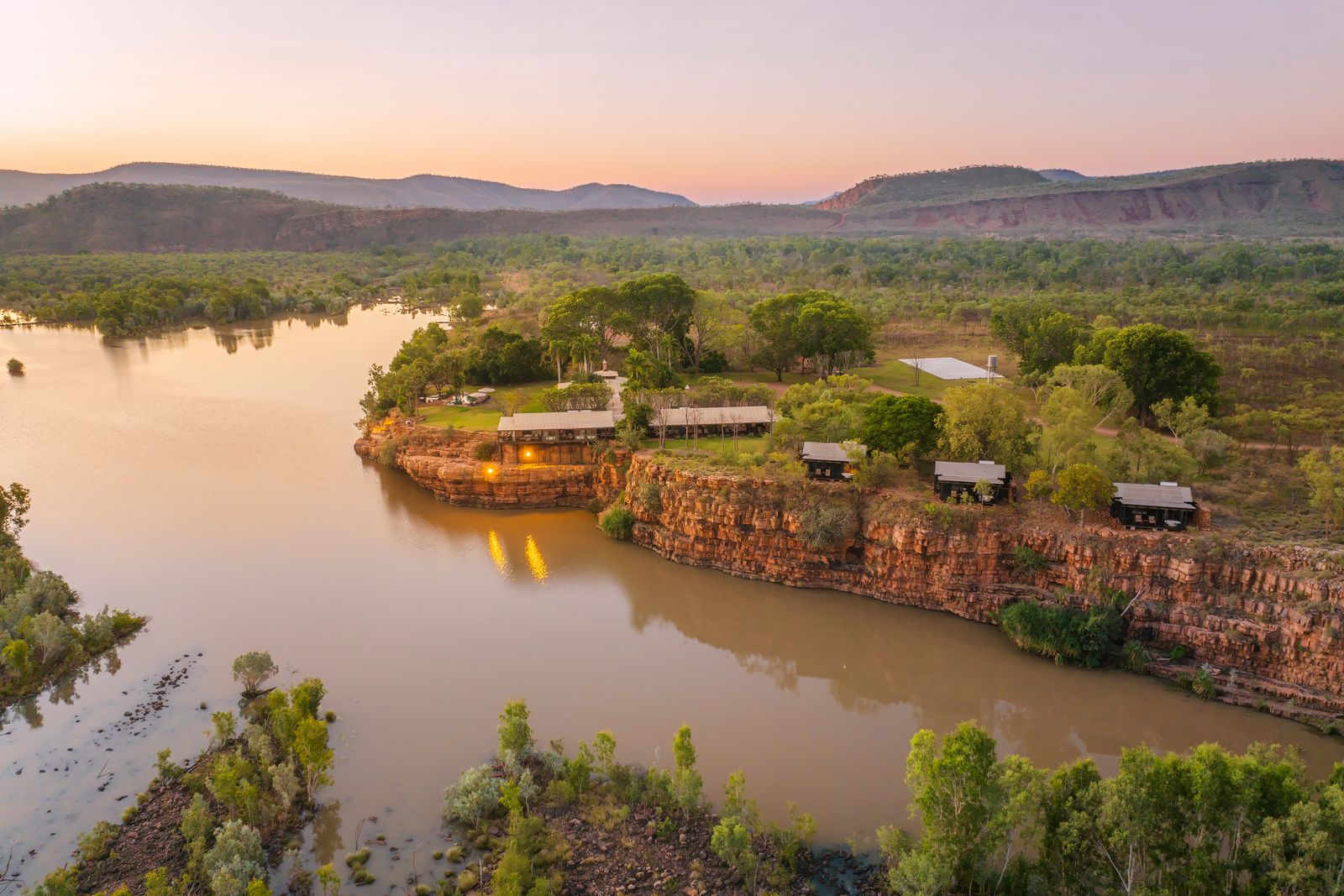 Image may contain Nature Outdoors Lake Water Scenery Architecture Building Plant Vegetation River and Aerial View