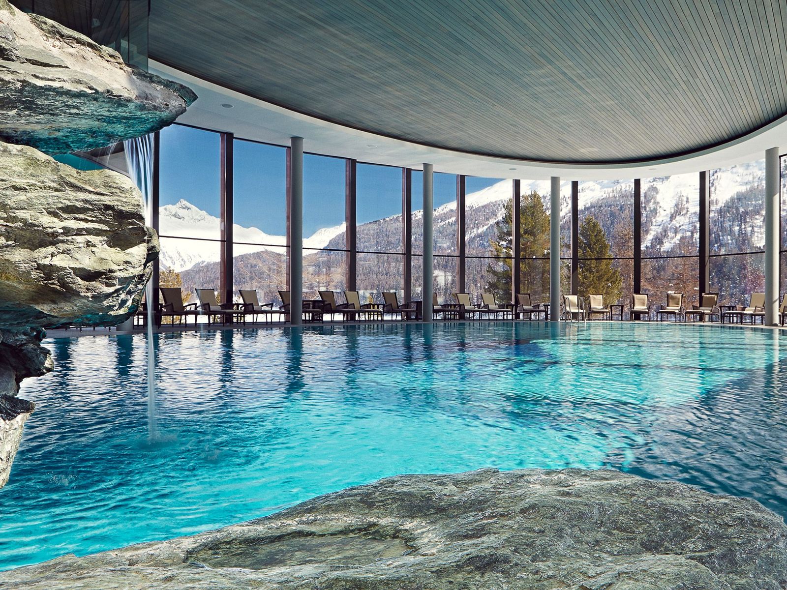 Image may contain Pool Water Swimming Pool Nature Outdoors Scenery Chair Furniture Indoors and Interior Design