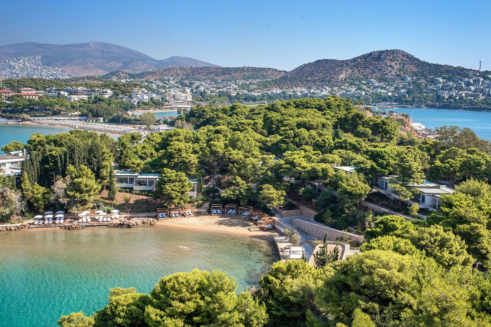 Image may contain Nature Outdoors Sea Water Shoreline Coast Plant Vegetation Scenery Land Tree Woodland and Lake