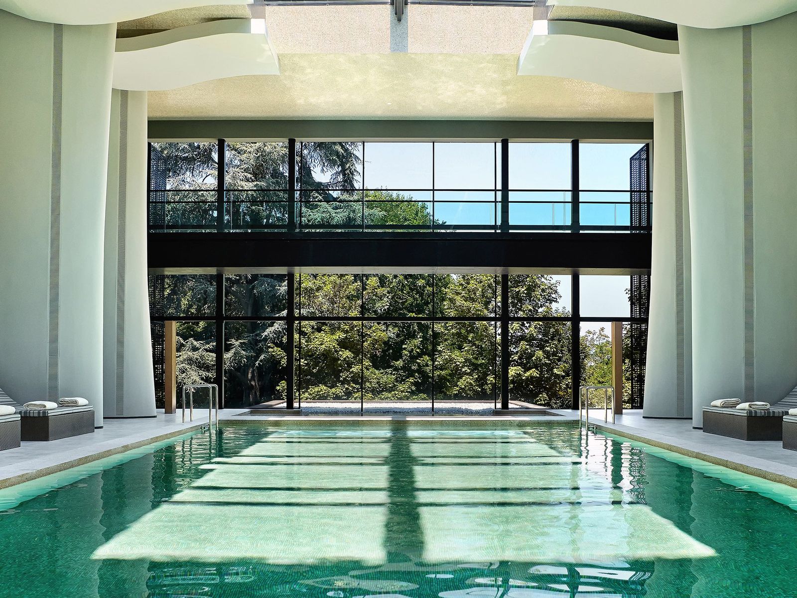 Image may contain Pool Water Swimming Pool Floor Indoors Interior Design Architecture Building Outdoors and Hotel