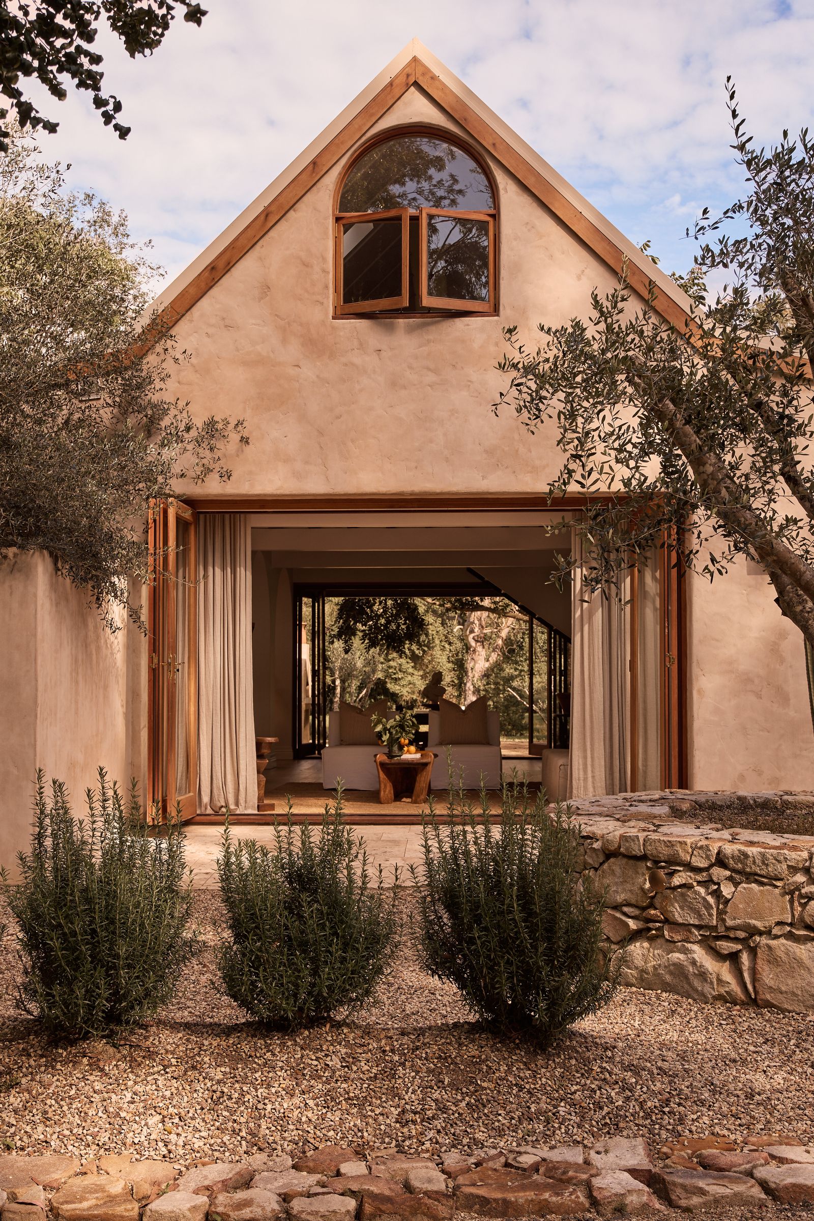 Image may contain Indoors Interior Design Architecture Building Cottage House Housing Villa Portico and Plant