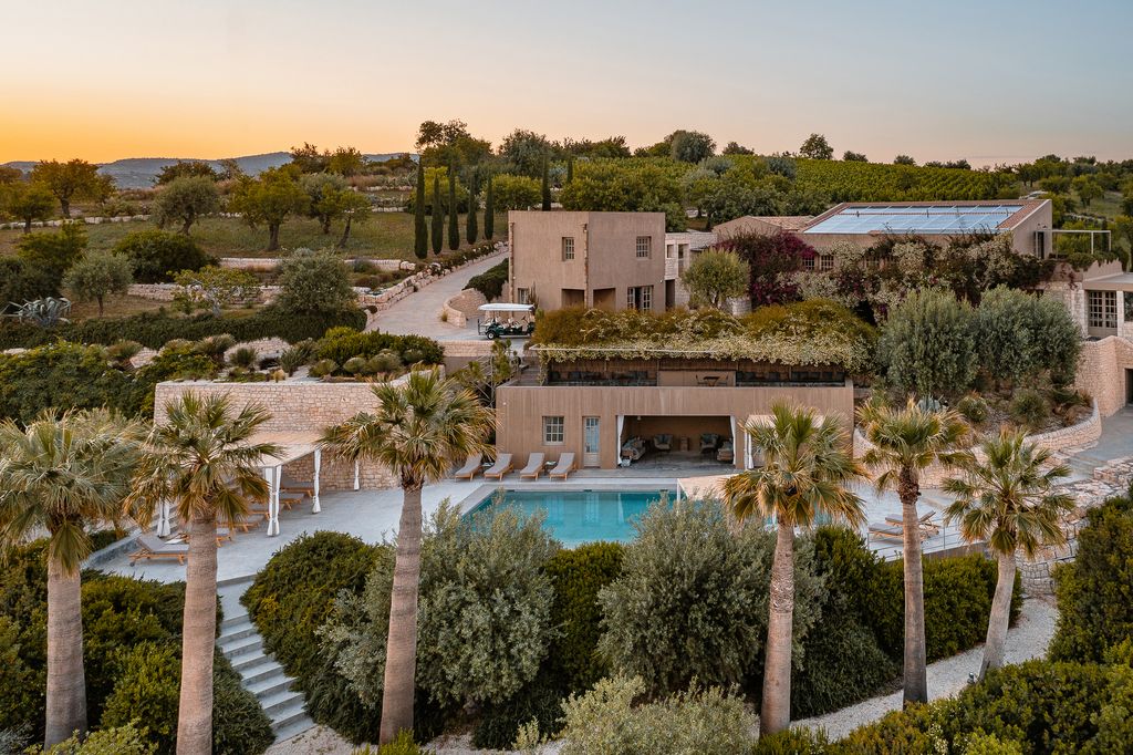 Not far from Noto on a hillside combed by olive and citrus groves lies Country House Villa Dorata  a modern iteration of...