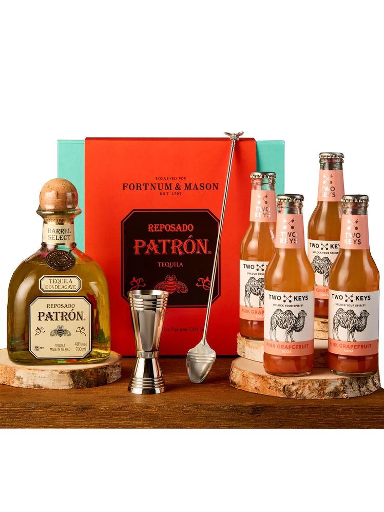 Image may contain: Bottle, Alcohol, Beverage, Liquor, Beer, and Beer Bottle