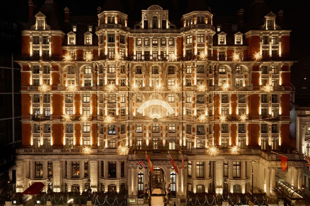 Image may contain City Architecture Building Urban Housing House High Rise and Person