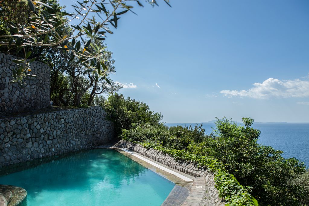 Image may contain Pool Water Swimming Pool Outdoors Aerial View and Nature